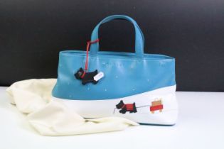 Radley ' Explorer ' picture bag featuring a scotty dog pulling a trolley in the snow, complete