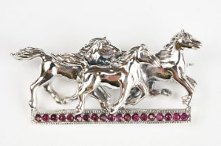 Silver Horse Brooch set with a Ruby platform