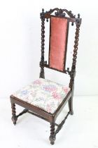 19th century Rosewood Nursing or Low Chair with barley-twist carved supports, upholstered back panel