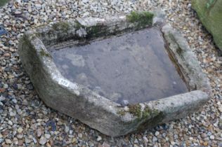 Stone trough of irregular form, measures approx 75cm at widest point
