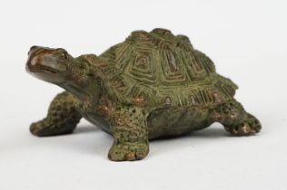 A Chinese ornamental bronze figure of a tortoise, approx 5cm in length.