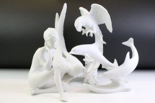 Three Kaiser white bisque porcelain models to include 489 Nude Study of a Woman, 401 Dolphins