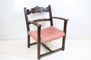 Early 20th century Low Elbow Chair, the top rail carved with a crown and scrolls, 73cm high x 56cm