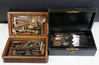 A collection of early 20th century scissors and sewing items together with a mother of pearl