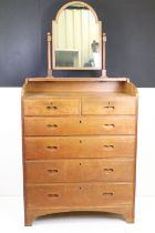 Arts and Crafts Chestnut Dressing Chest with swing mirror over a chest of two short and four long