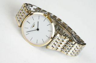 A gents Le Grande Classic De Longines with white enamel dial on original bi metal strap