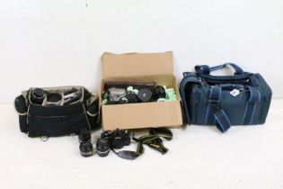 A collection of mixed photography equipment to include camera's, lenses, video camera and various