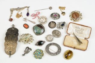 A collection of mixed costume jewellery to include hallmarked sterling silver brooches and