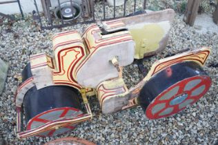 Mid 20th C steam roller fairground ride with pin striped detail, approx 104cm long (a/f)