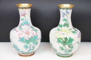 Pair of Chinese enamelled vases having a white ground with floral sprays and bird detailing.