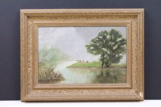 20th Century oil on board painting depicting resting cattle within a river scene. Set within a