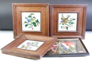 Three Minton Hollins & Co ceramics tiles decorated with birds, approx 14cm x 14cm, framed;