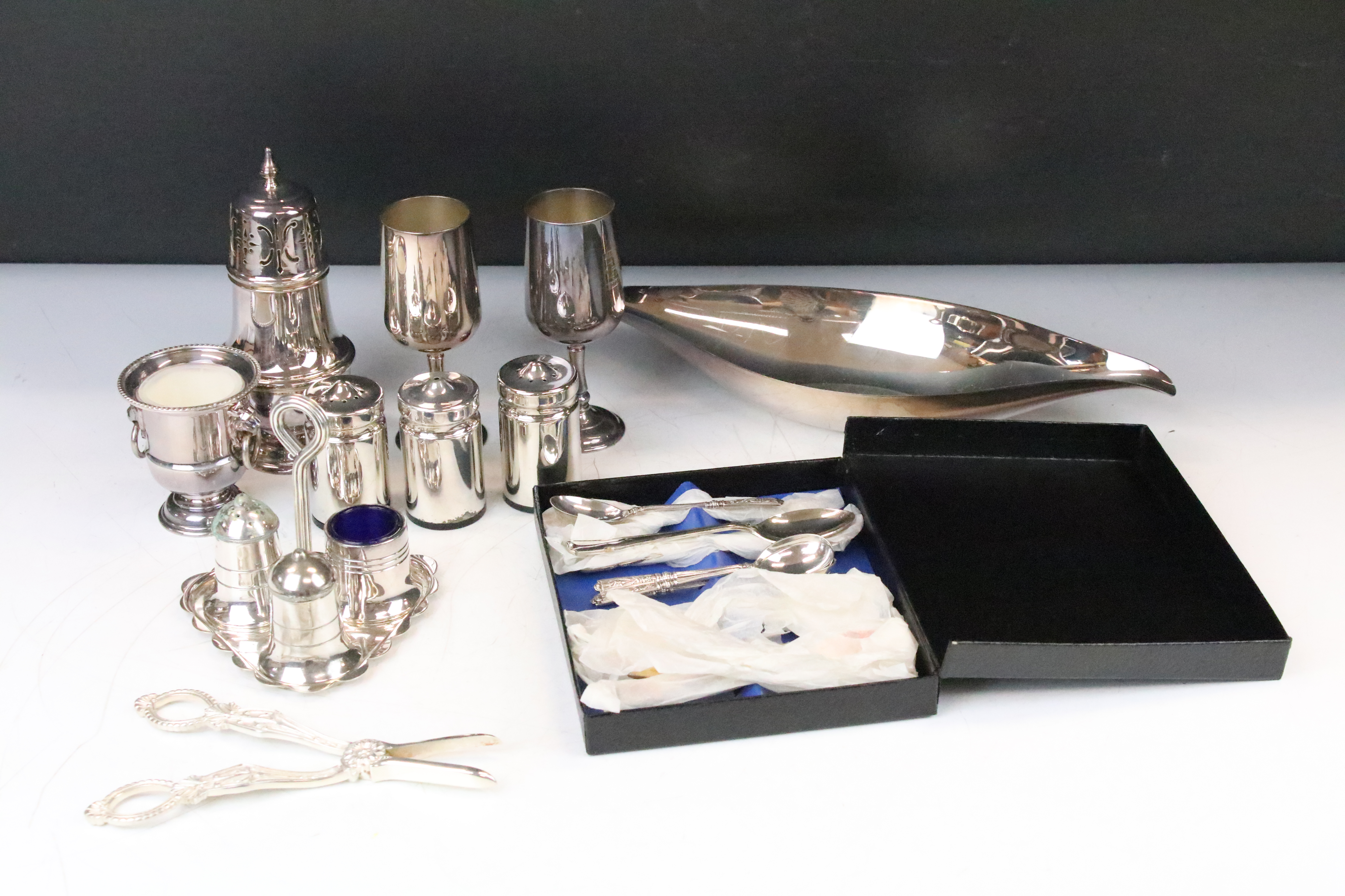 Collection of mixed silver plate to include grape scissors with cast decoration...