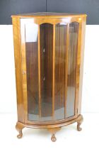 1930's Walnut Bow Front Glazed Display Cabinet, the single door opening to two glass shelves,