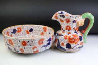 Ironstone wash jug & bowl, the jug of hydra form (approx 23cm tall), decorated in the Imari palette,