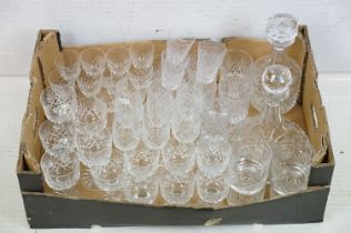 Collection of cut crystal glass ware to include two decanters, tumblers, wine glasses, champagne,