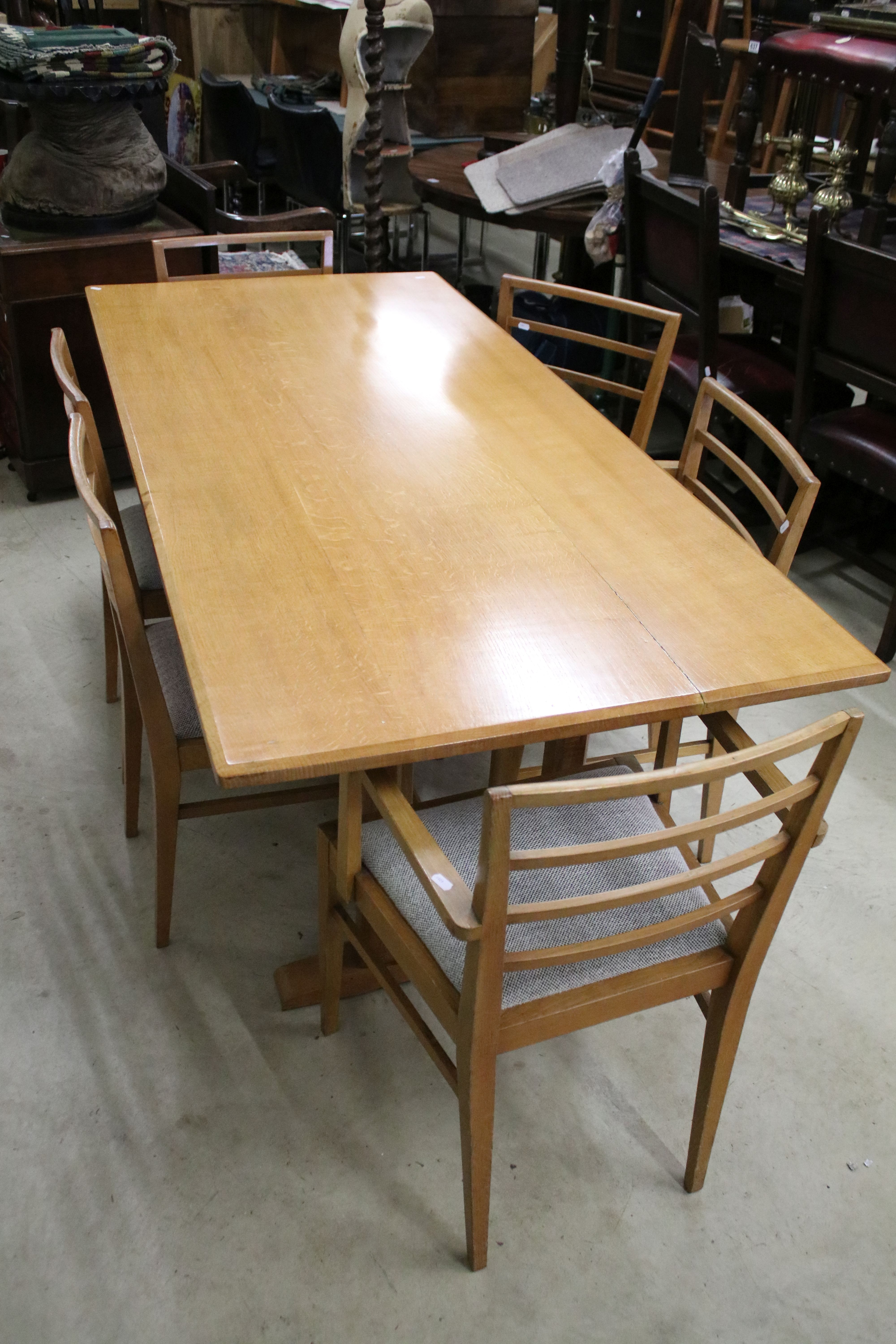 In the manner of Heals of London, Pale Oak Rectangular Dining Room Table with chamfered edge, raised