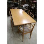 In the manner of Heals of London, Pale Oak Rectangular Dining Room Table with chamfered edge, raised