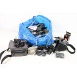 A collection of mixed camera's, lenses and accessories to include Canon, Ricoh and Olympus examples.