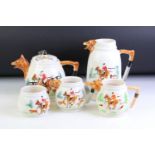 PPC Hunting Scene porcelain tea ware with moulded decoration, to include teapot, water jug and 2 x