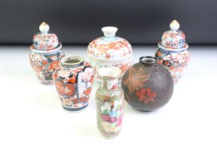 Six Chinese porcelain vases / jars, to include a pair of Imari vases & covers (13.5cm high), Famille