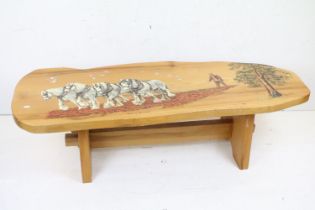 Hand Carved Oak Coffee Table, the shaped top painted with a countryside scene of a farmer