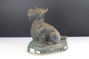 Cast iron doorstop modelled as a Scottish Terrier dog, measures approx 29cm tall