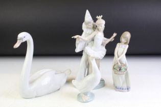 Three Lladro porcelain figures to include 4882 Carnival Couple (26cm high), 5065 floral