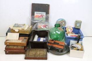 A large group of mixed collectables to include advertising tins, coins, building blocks,