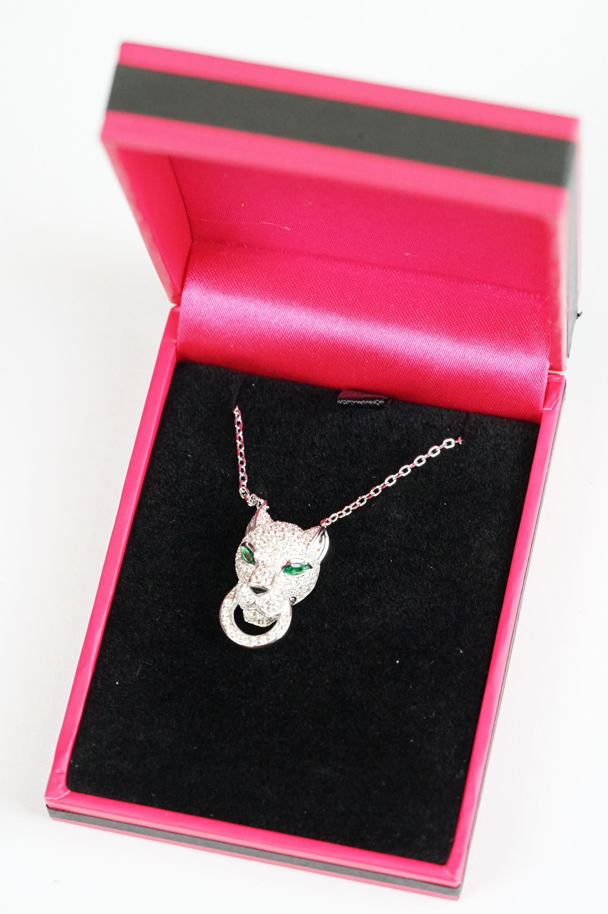Silver and CZ Designer style Leopard Head Pendant with Emerald eyes