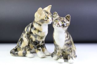 Two Winstanley Pottery seated tabby cat figures, size 3 and 4, with glass eyes, signed to bases,