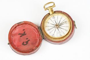 An early 20th century pocket compass within original protective case.