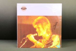 Vinyl / Autograph - David Bowie - Santa Monica ’72, UK double clear vinyl, signed by Trevor Bolder -