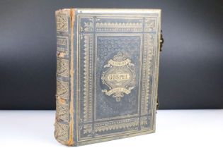 An antique Brown's Family Bible with numerous colour illustrations and a family portrait gallery