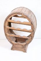 Wooden Coopered Wine Rack of oval form, 65cm high x 44cm wide x 24cm deep