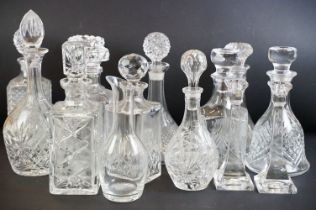 Collection of twelve 20th century glass decanters of varying forms to include a ships decanters,