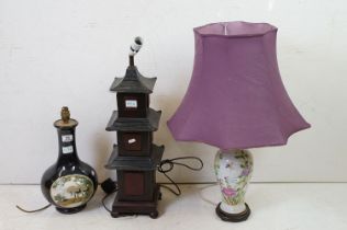 Three table lamps to include a pottery baluster form example with moulded stork panel (approx 40cm