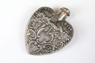 A fully hallmarked sterling silver heart shaped scent bottle with Repoussé decoration, hallmarked to