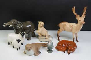 Collection of mostly Beswick ceramic animals to include an elephant, fox, stag, horned sheep as well