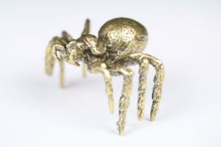 An ornamental solid brass figure of a Tarantula spider, measures approx 5cm in width.