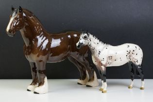 Two Beswick horses to include a white footed shire horse together with a black and white appaloosa