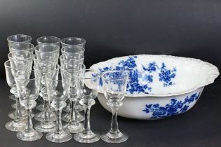 Set of 16 French wine glasses with bucket-form bowls raised on knop stems, with circular feet (