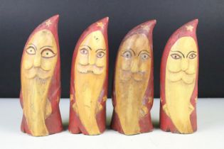 Set of four Scandinavian style folk art painted wooden figures, tallest approx 20cm