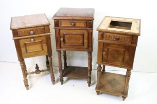 Three French Walnut Pot Cupboards, two with marble tops, one lacking marble top, largest 88cm high x