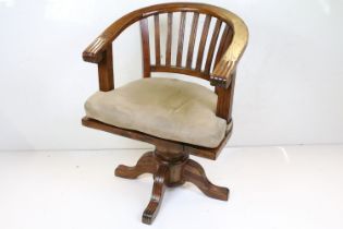 Hardwood Tub Swivel Chair with slat back and substantial bulbous support with four splayed legs,