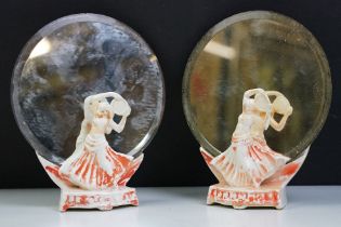 Pair of Art Deco ceramic mirror stands in the form of belly dancers, each holding a round bevelled