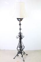 Late 19th Scrolling Wrought Iron Standard Oil Lamp with hammered coppered well, later converted to