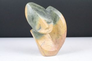 Zimbabwean carved & polished Shona stone sculpture depicting a stylised face, approx 16cm tall