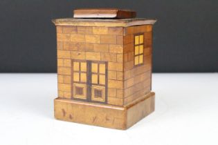 Chinese wooden puzzle money box modelled as a house, character marks to base, approx 12cm high