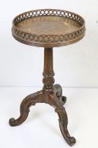 Mahogany Circular Lamp Table in the George III manner with pierced gallery, carved column and